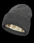The Cozeo™ hair wellness essentials featuring our signature friction-free gray satin-lined beanie