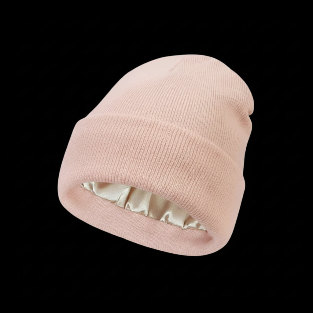 The Cozeo™ hair wellness essentials featuring our signature friction-free pink satin-lined beanie