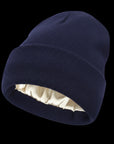 The Cozeo™ hair wellness essentials featuring our signature friction-free navy satin-lined beanie